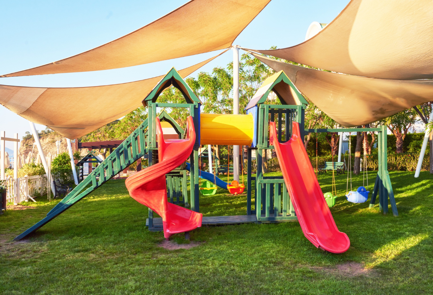 Play area with a swing for children